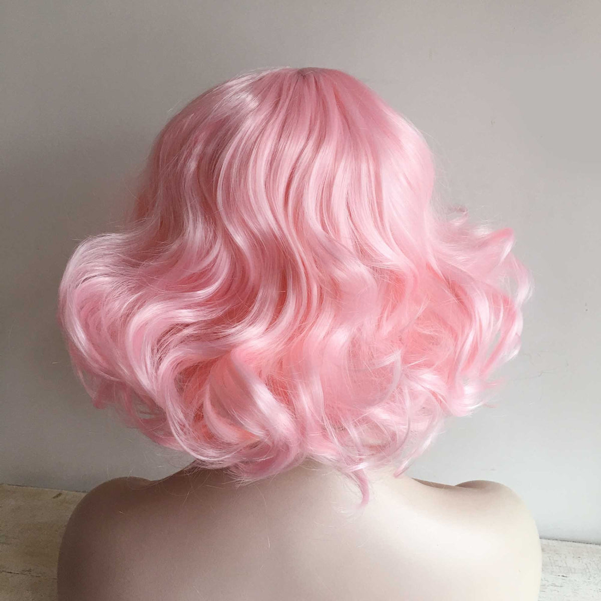 nevermindyrhead Women Pink Short Curly Fringe Bangs Lolita Wig